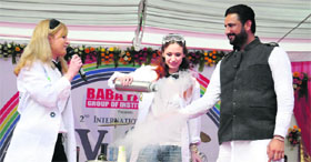Ukrainian students demonstrate a chemical experiment during the annual fest Vibgyor-14 at the Baba Farid Group of Institutions in Bathinda on Friday.