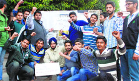Students hold a protest at DAV College, Sector 10, in Chandigarh on Friday.
