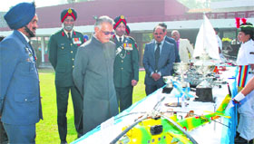 Punjab Governor Shivraj Patil takes a look at aeromodels during a function at the Punjab Raj Bhawan in Chandigarh on Friday.