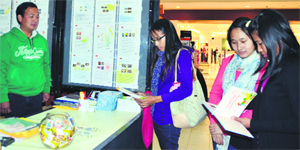 Visitors at the philately exhibition organised by the General Post Office in Dehradun on Friday. 
