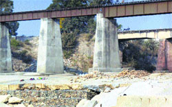 Damaged protection steps of the Chakki bridge near Kandwal in Nurpur. Photo by writer