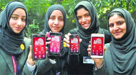 Four students of Aryans Colleges of Engineering show the application on their smartphones on Friday.