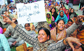 Members of the Block Congress Committee, Bishnah, protest in Jammu on Friday.