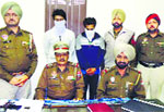 The accused in police custody at Samrala. A tribune photograph