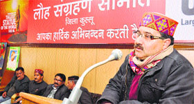 State BJP vice-president Ram Singh addresses party leaders and members in Kullu on Saturday.