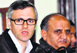 CM Omar Abdullah with his deputy Tara Chand in Jammu on Saturday.