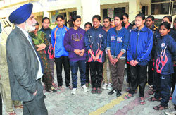Education Minister Sikander Singh Maluka talks to the players at Maluka Sports Wing on Saturday. Tribune photo: Pawan Sharma