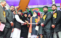 Muslim leaders present a sword to Punjab Chief Minister Parkash Singh Badal at the foundation stone-laying function of Islamia Public School in Ludhiana on Saturday. Photo: Inderjeet Verma