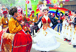 Artistes perform on the second day of the Surajkund International Crafts Mela in Faridabad on Sunday