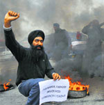 Sikhs hold a protest in Jammu on Sunday.