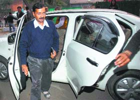 Delhi Chief Minister Arvind Kejriwal arrives at his new residence at Tilak Lane in Central Delhi