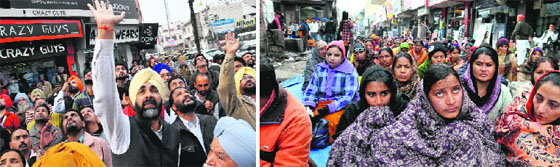 PPP chief Manpreet Badal waves to the AIE/EGS teachers who have been sitting atop a water tank for two days; and (right) the protesting teachers brave the cold weather and continue their stir in Bathinda on Monday. Tribune photos