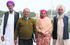 Cancer survivors (from left) Gurjant Singh, Subhash Chander Thukral, Surinder Kaur and Lakha Singh in Bathinda on Monday. Tribune photo