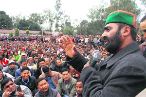 Uttarakhand Cabinet minister Mantri Prasad Naithani addresses teachers under the banner of Junior High School Shikshak Sangh at the Parade ground in Dehradun on Monday