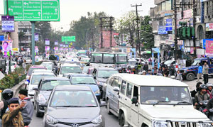 Due to several protests in the city, commuters were a hassled lot, courtesy long traffic jams throughout the day. A view of one such traffic jam at the Rajpur Road in Dehradun on Monday.