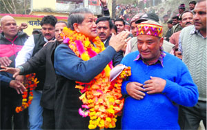 Chief Minister Harish Rawat meets people at Tharali in Chamoli on Monday
