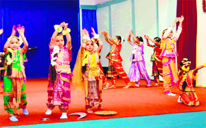 Children perform a dance on the eve of Basant Panchami at Gayatri Vidyapeeth ,Shantikunj, in Haridwar on Monday.