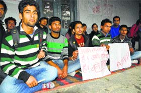 ABVP activists sit on a chain hunger strike on the Government College campus in Dharamsala on Monday