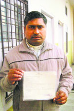 Vinod shows an official letter declaring him dead. 