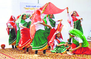 Girls perform at a cultural programme on the eve of Basant Panchami in Gurgaon on Monday. 