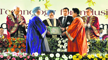 President of Indian Science Congress RC Sobti and Jammu varsity V-C Prof MPS Isher (blue turban) felicitate PM Manmohan Singh at a function in Jammu on Monday. Governor NN Vohra and Chief Minister Omar Abdullah are also seen in the picture