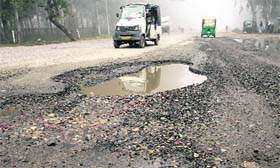 A view of a badly damaged road in Jalandhar