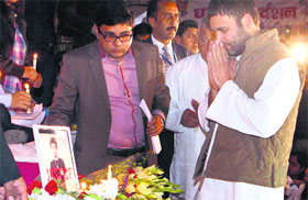 Congress vice-president Rahul Gandhi pays tribute to Arunachal Pradesh MLAs son Nido Taniam in New Delhi.