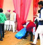 A student pick up garbage at a family function of a Chief Parliamentary Secretary in Faridkot. tribune file photo