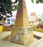A Dashmesh Pillar with missing tiles on Guru Gobind Singh Marg in Muktsar. A Tribune photograph