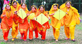 Girls in a joyous mood while celebrating Basant Panchami at MCMDAV College, Chandigarh, on Tuesday.