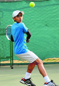 Rishabh Sharda returns a shot during the CLTA-AITA Talent Series Tennis Tournament at the CLTA courts, Sector 10, Chandigarh on Tuesday.