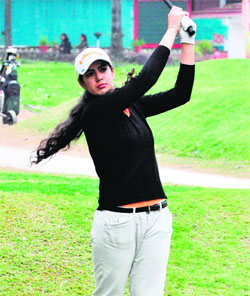 Tavleen Batra in action during the 20th Punjab Open Ladies Amateur Championship 2014 at Golf Club in Chandigarh on Tuesday.