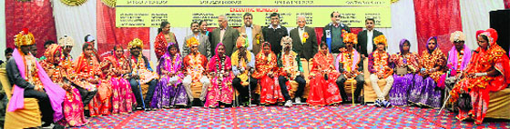 Brides and grooms at a mass marriage function in Sector 21, Chandigarh, on Tuesday.