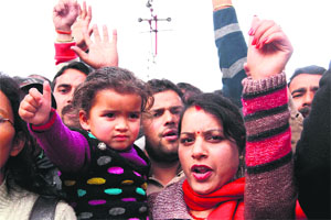 Unemployed people protest in Dehradun on Tuesday.