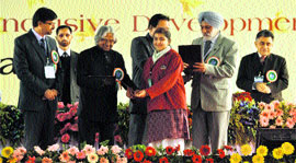 Former President A P J Abdul Kalam presents an award to a student at the Children Science Congress in Jammu on Tuesday.