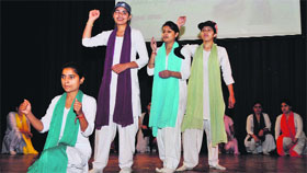 Students present a skit at Government College for Women, Gandhi Nagar, in Jammu on Tuesday.
