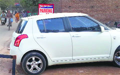 A car donning a black film parked at the Mini-Secretariat in Ludhiana. A tribune photograph