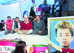 Delhi CM Arvind Kejriwal and Education Minister Manish Sisodia with North-East students at a dharna seeking justice for Arunachal Pradesh student Nido Tania, at Jantar Mantar in New Delhi on Tuesday