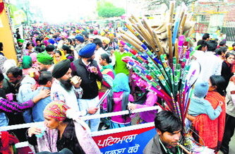 Devotees at the historical Gurdwara Dukh Nivaran Sahib on Vasant Panchami in Patiala.