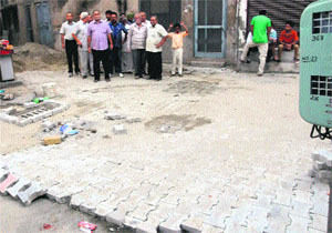 Interlocking tiles being fixed in Bathinda.