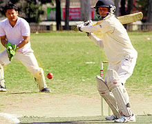 A batsman in action in a match in the Dehradun District Cricket League at OFD ground in Dehradun on Wednesday