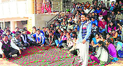 Non-teaching staff of Chaudhary Devi Lal University stage a dharna in Sirsa on Wednesday