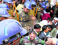 Police remove protesters in Jind on Wednesday
