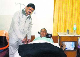 Dr Sanjay Aggarwal with patient Surat Singh at Solan