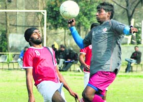 Players during the football trials in Jalandhar on Wednesday
