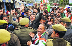 Youth Congress members protest against the Custodian Department on Wednesday. Tribune photo: Inderjeet Singh