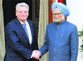 Prime Minister Manmohan Singh shake hands with German President Joachim Gauck before a meeting in New Delhi on Wednesday.