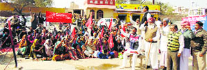 Residents of Government Seed Farm hold a protest in Abohar on Wednesday