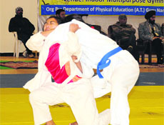 Judo players during a match at the All India Inter-University Judo (Womens) Championship 2013-14 in Amritsar on Thursday.