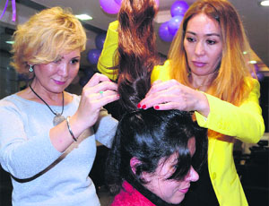 International celebrity stylists Vanera and Ferida give a client a makeover at VLCC in Amritsar on Thursday.